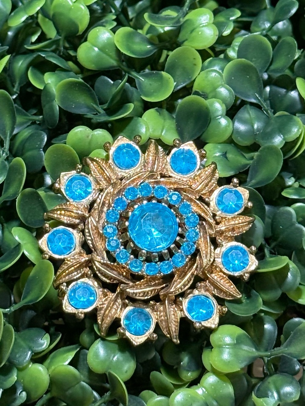 Vintage Gold-Tone Floral Brooch with Bright Turquoise Crystals